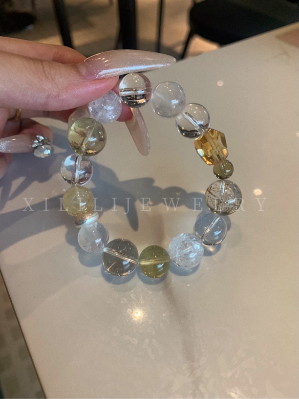 锆石（处理）《0403》原创设计轻奢蓝兔毛茶水晶手串