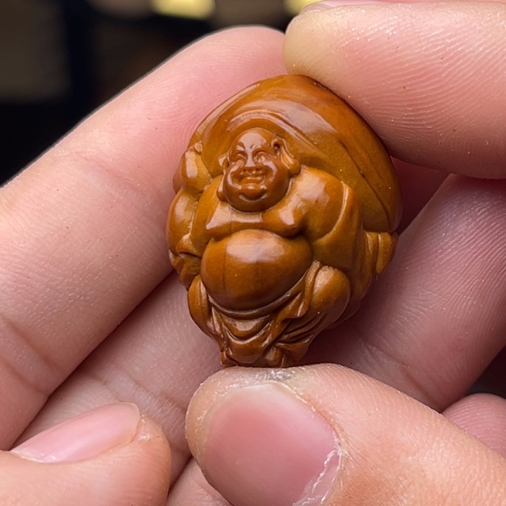 橄榄核手串月****达橄榄核钱袋弥勒2.1