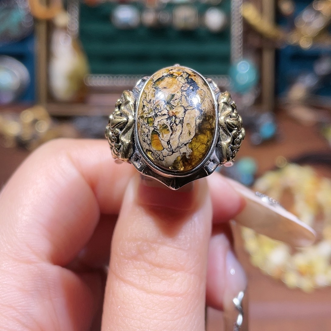 狐****琥珀银S925镶嵌戒指