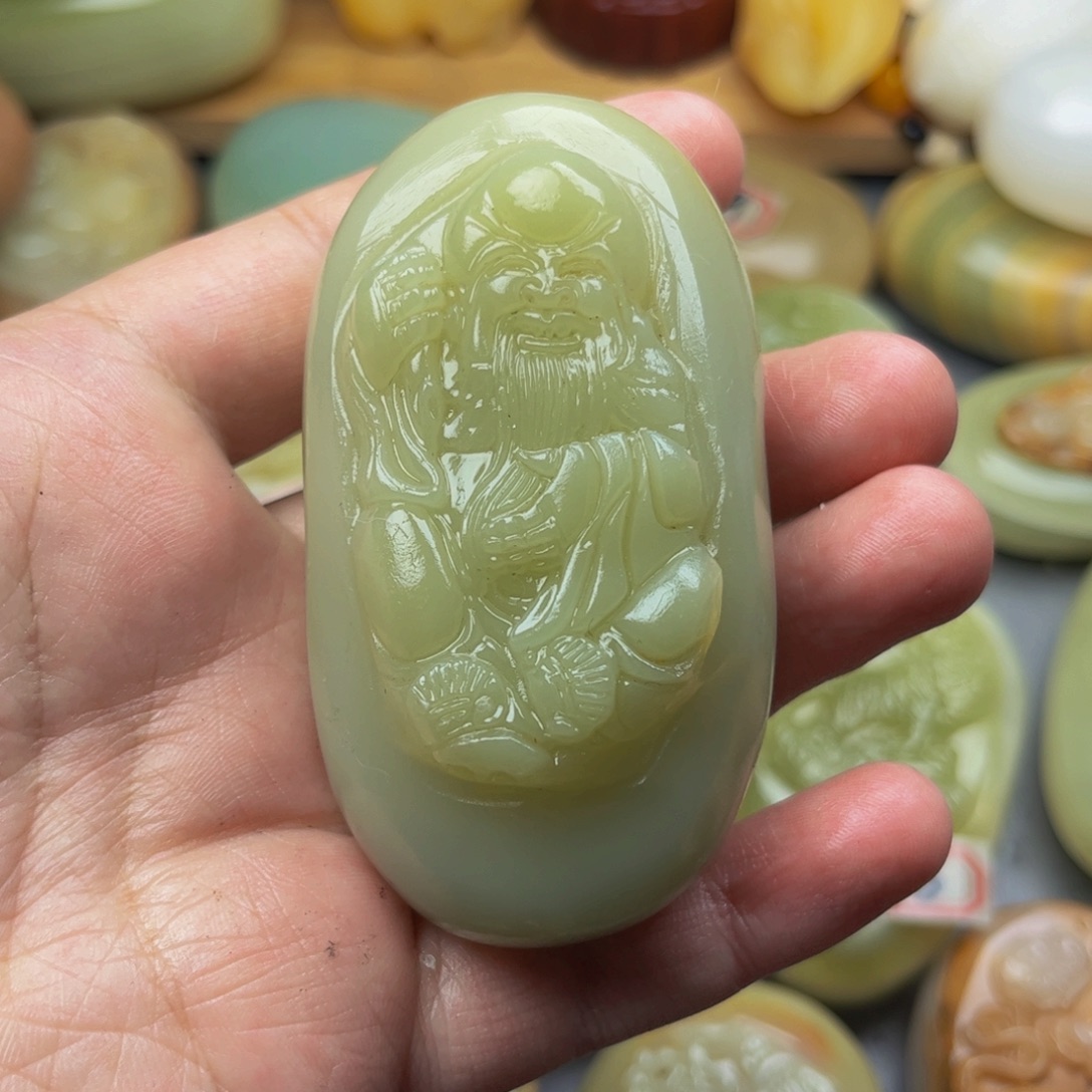 石材方解石手把件寿星