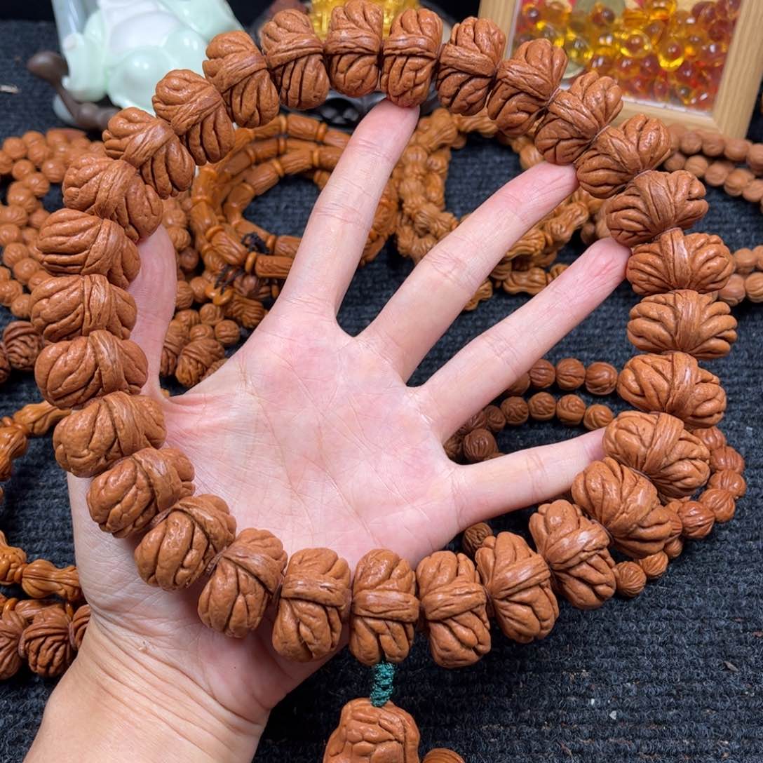 文玩核桃手串虚**谷C5桃核手持