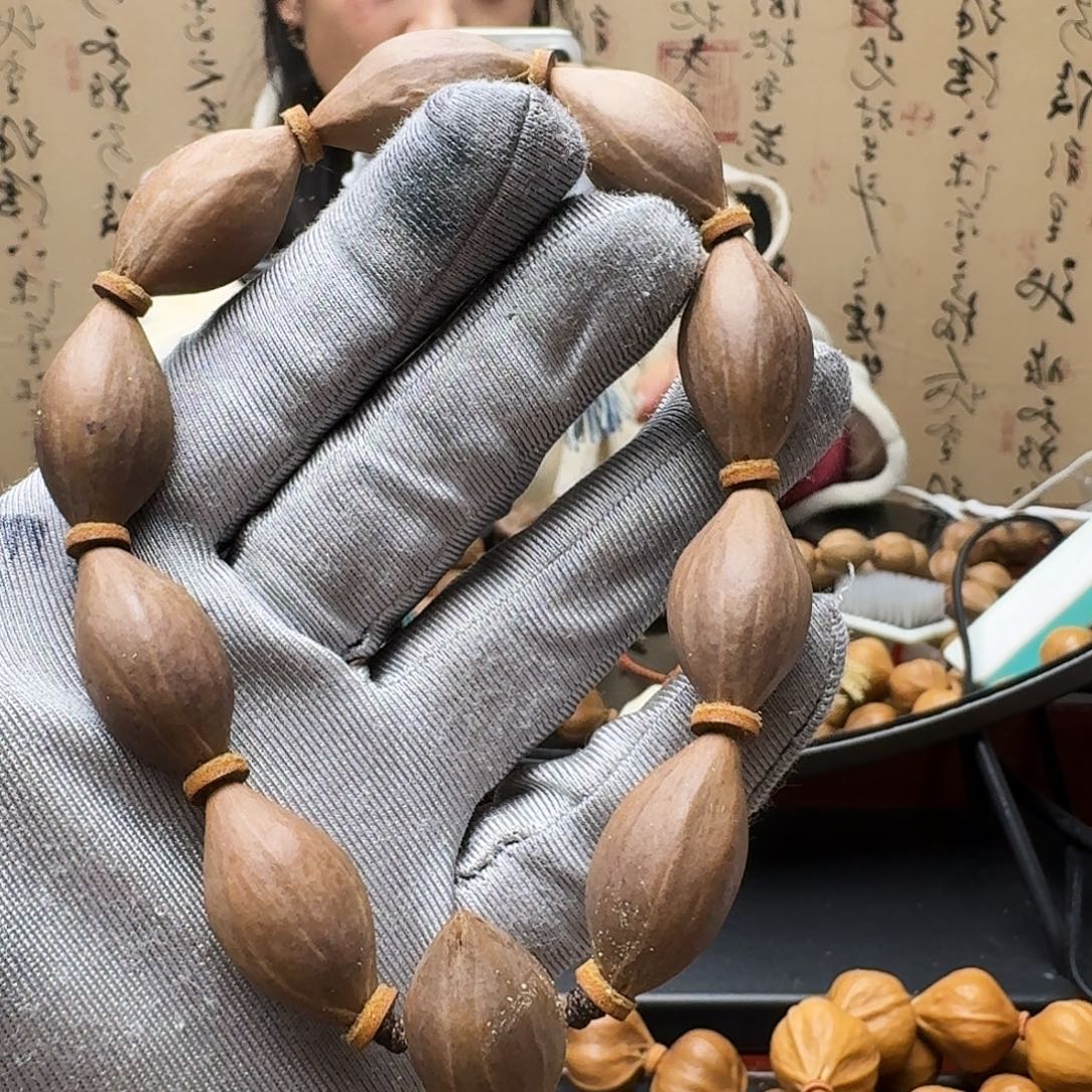 刘***宝手串橄榄核紫皮核