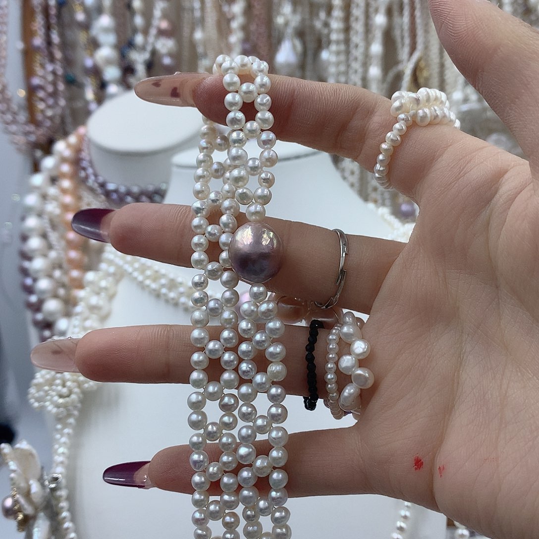 丫***头淡水珍珠银S925镶嵌耳饰