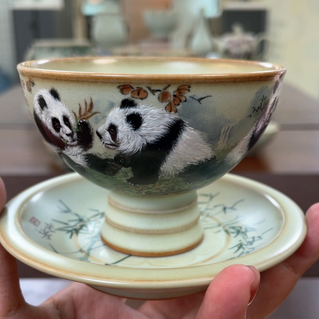 周泽堂彩绘。  熊猫