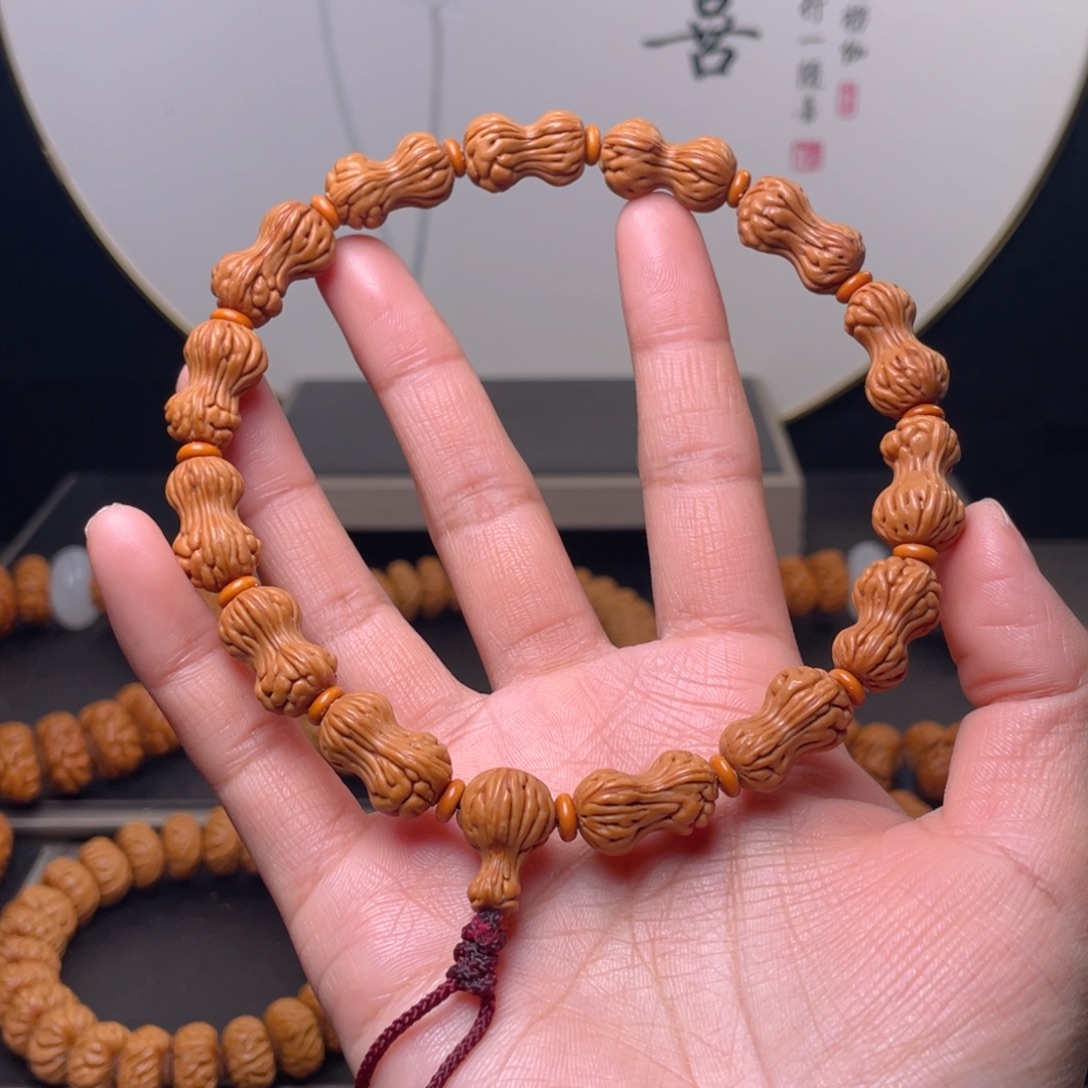 桃核吊坠花生手持