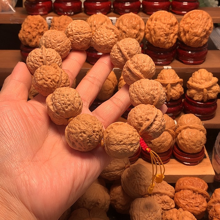 吊坠桃核铁磨盘手持