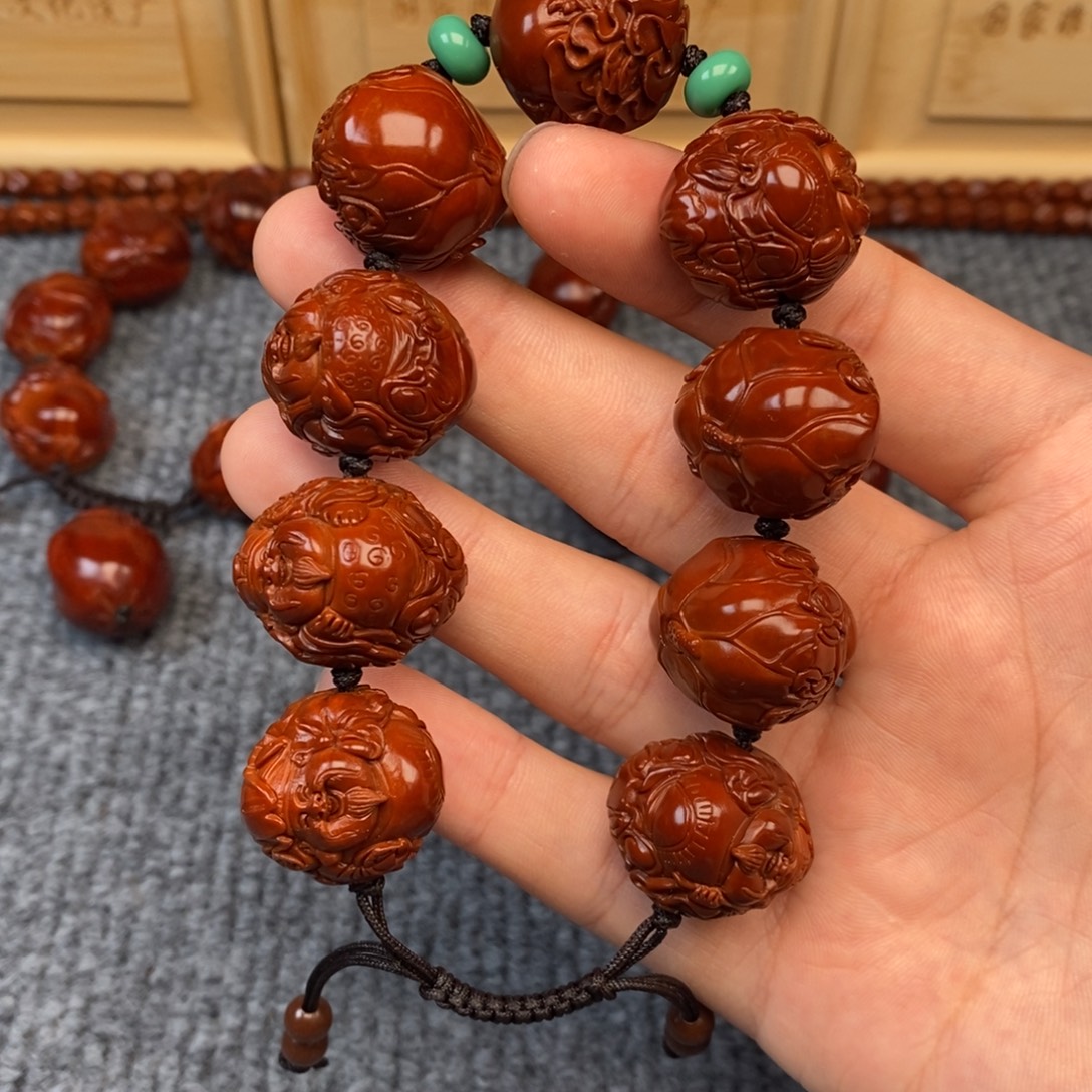 正***一吊坠橄榄核荷叶横财