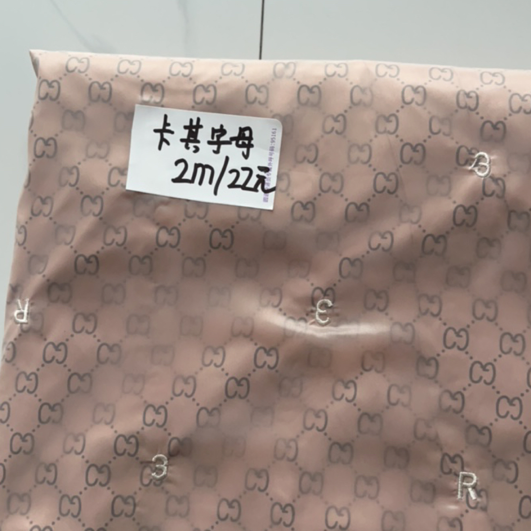 卡其字母羽绒服布二合一按斤卖不退换珍惜你我时间2米22yuan