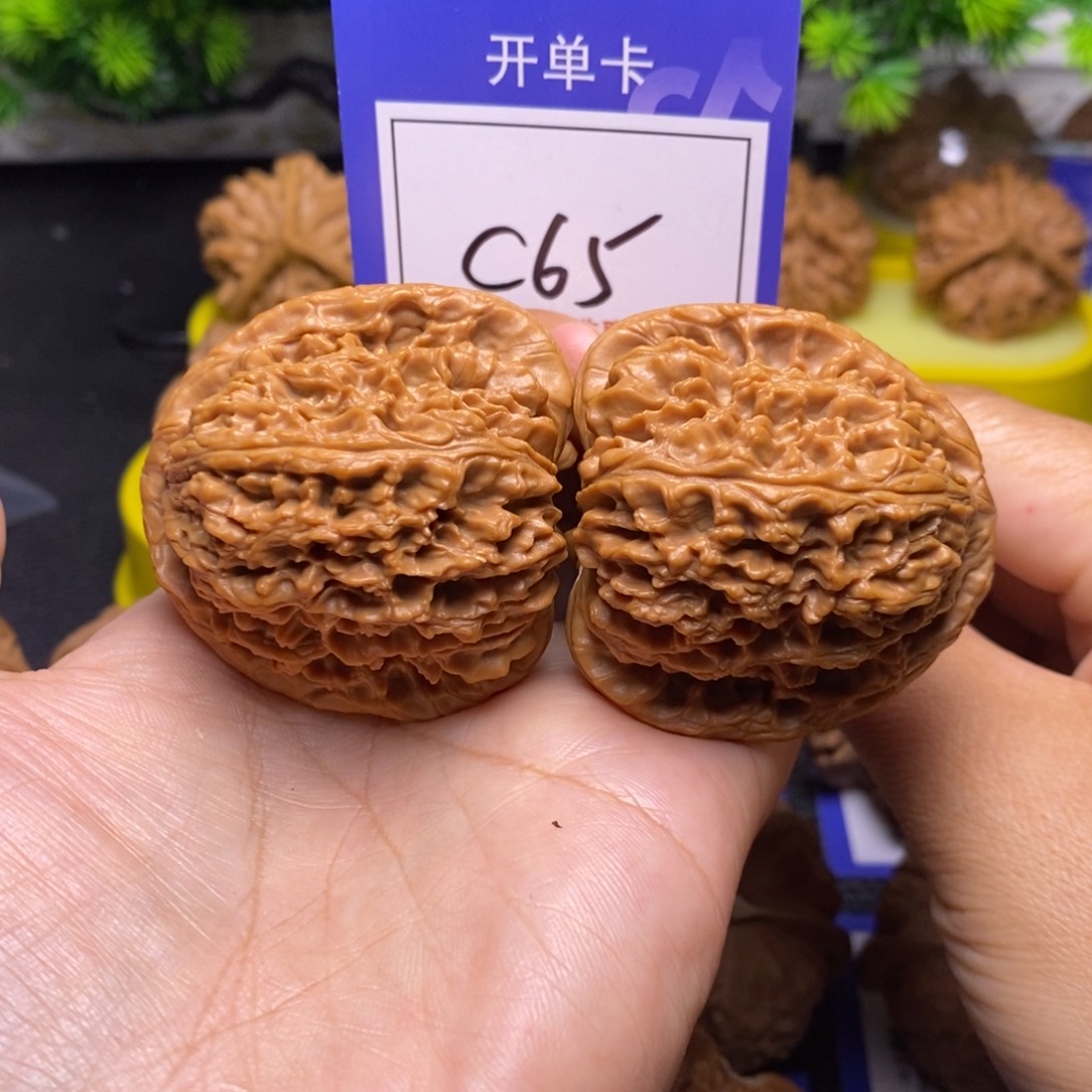 嘟***嘟把件桃核46全品三角疆c65