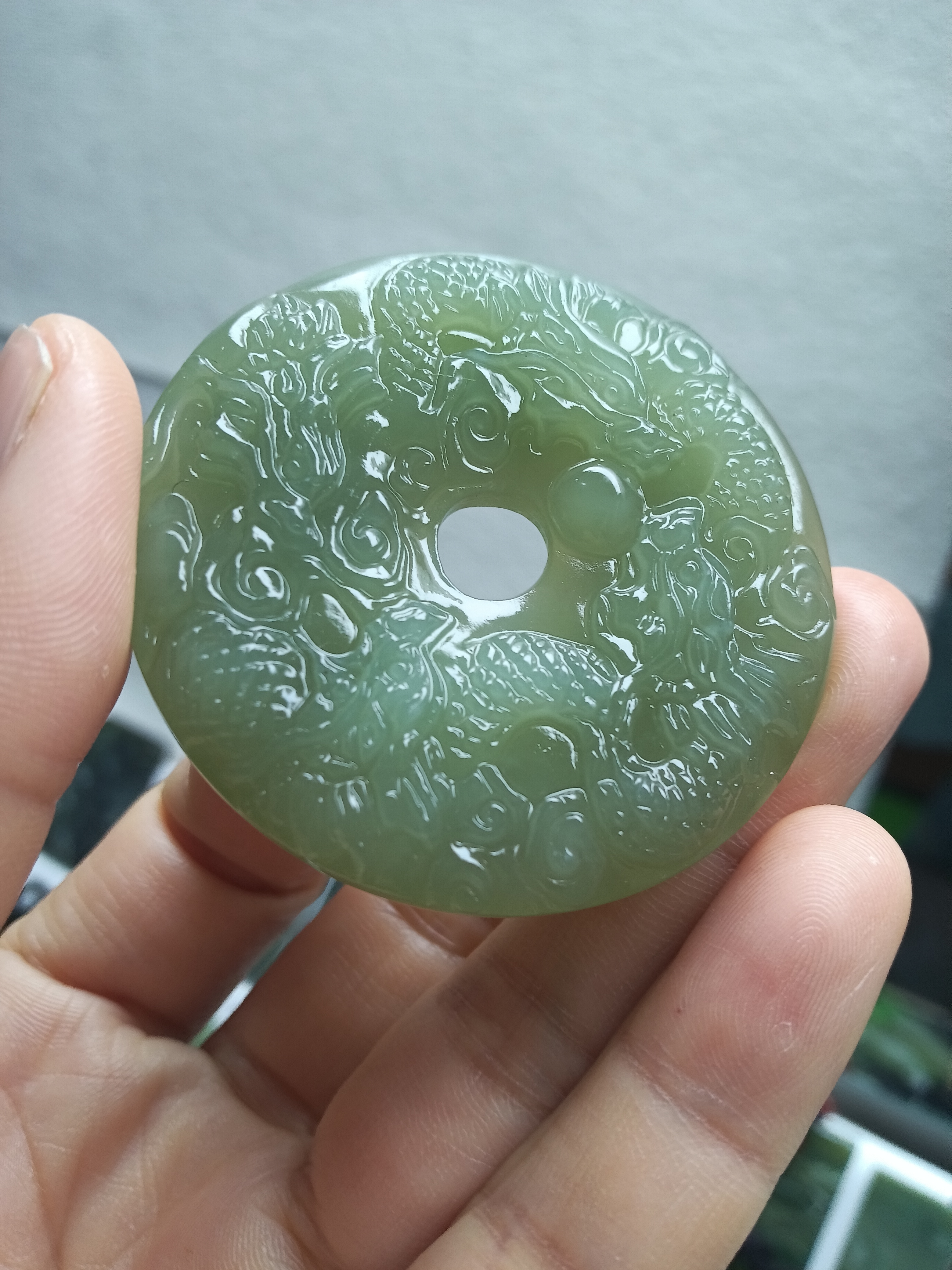 和田玉青海料湖水绿双面雕刻九龙护主