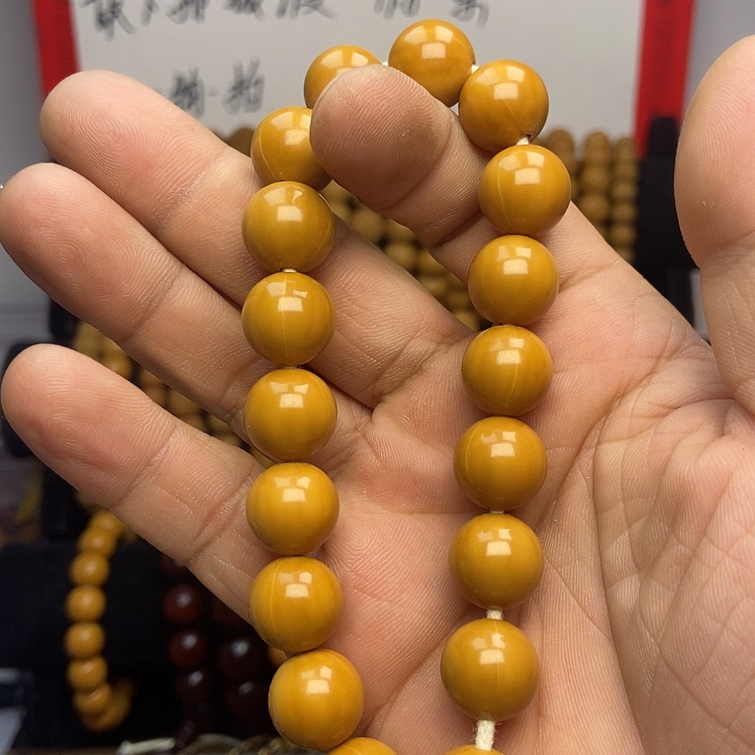 梧****猴头核桃手串猴头手串，光珠一条