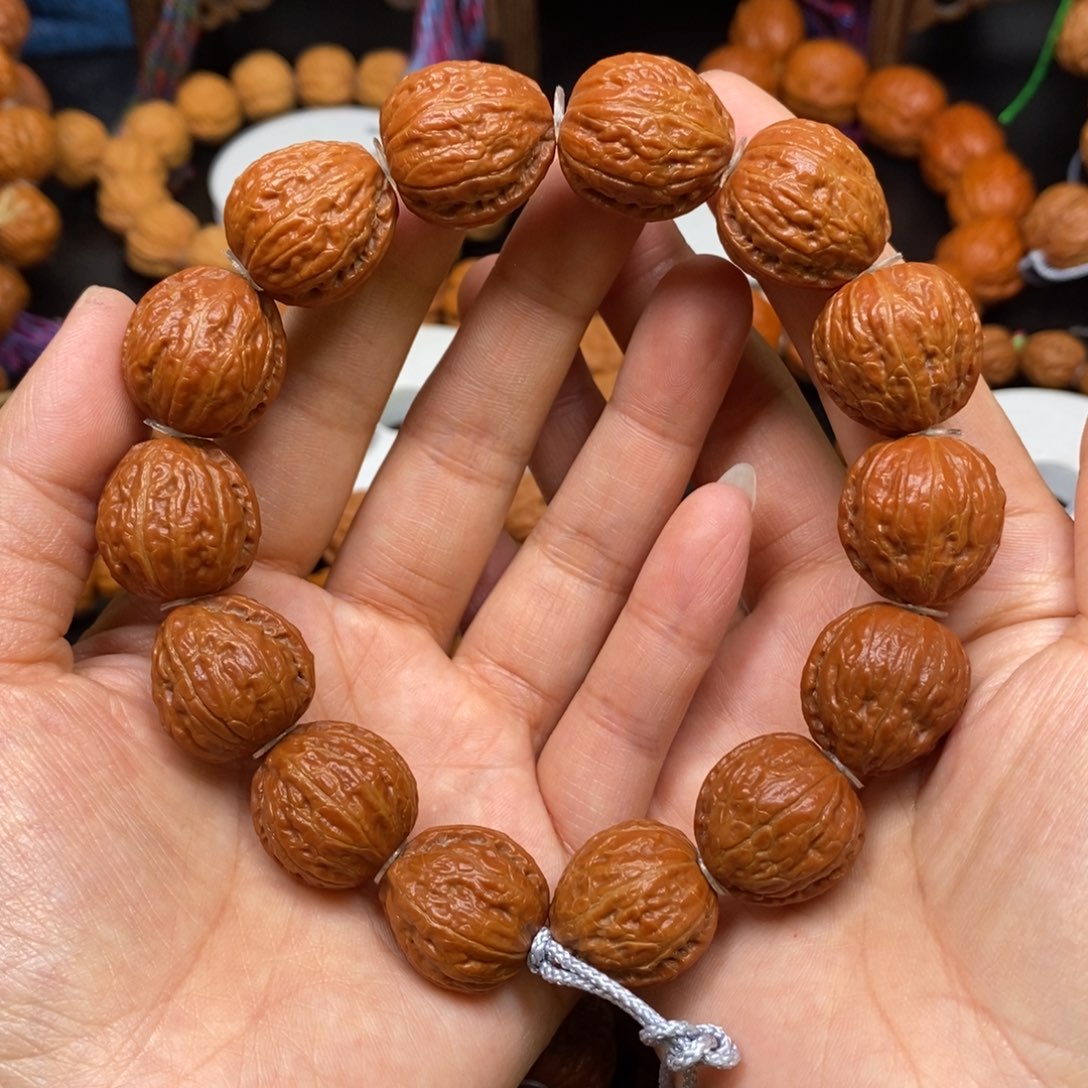 桃核手串小红钱袋