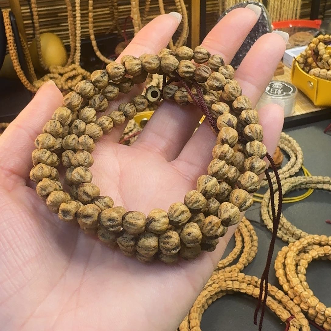 柏香籽/百香籽把件橘****?