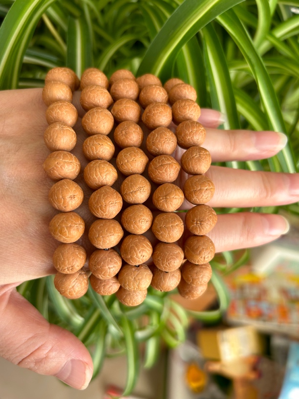 尼泊尔11.5mm橘油皮玉化底凤眼108加6