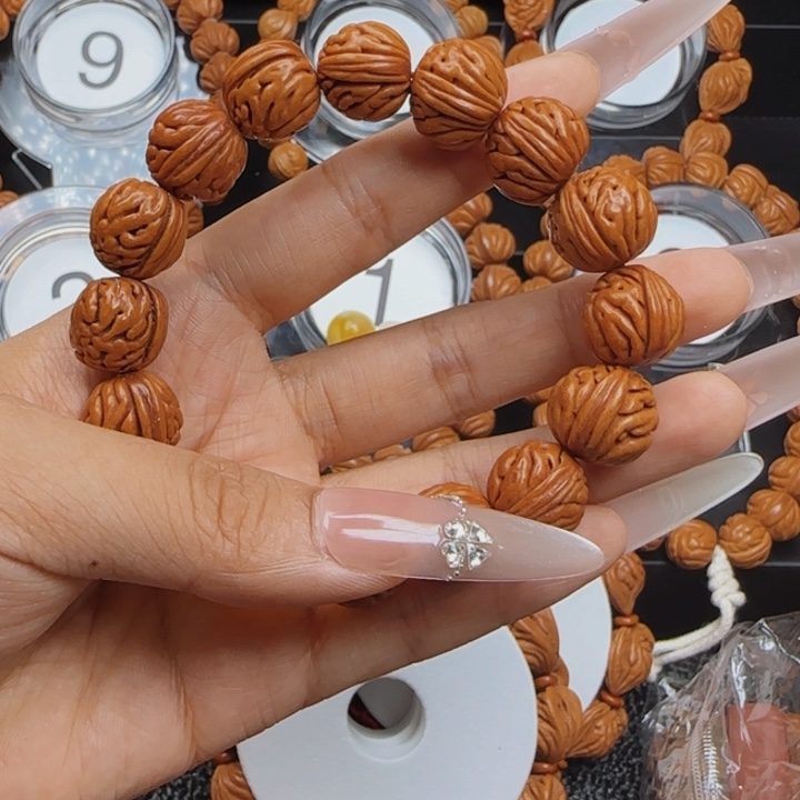 万***空文玩核桃吊坠龙纹桃核