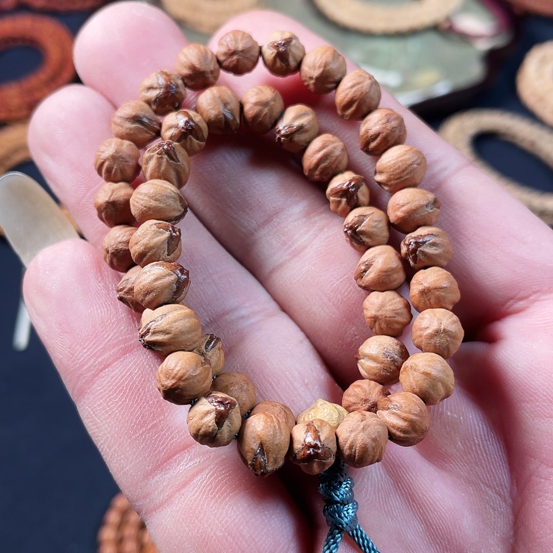 柏香籽/百香籽吊坠7mm红芽三棱原桩横打手持