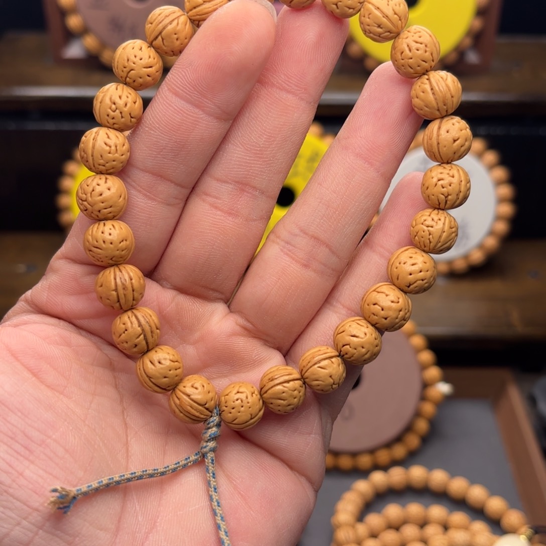 帖***子桃核手串皮球手持