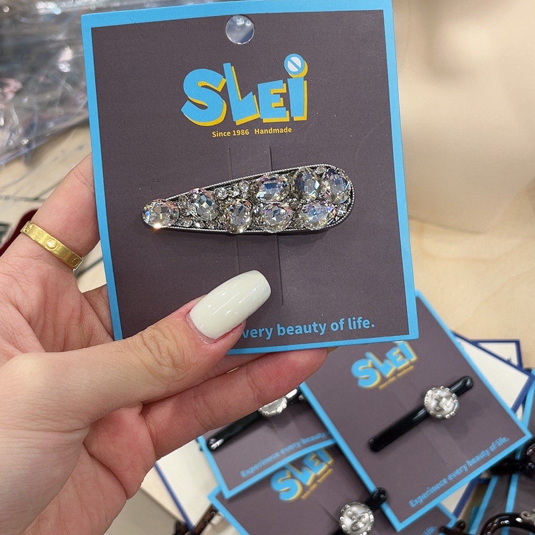 布艺非金属白色钻三角发夹