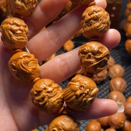 橄榄核吊坠向死而生