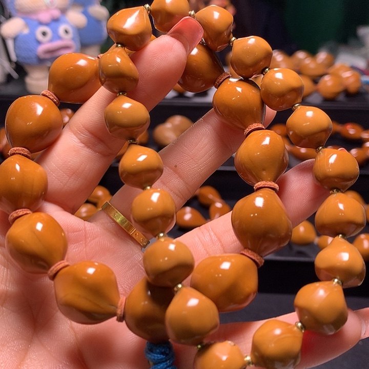 乔***部橄榄核手串/手链三花手串