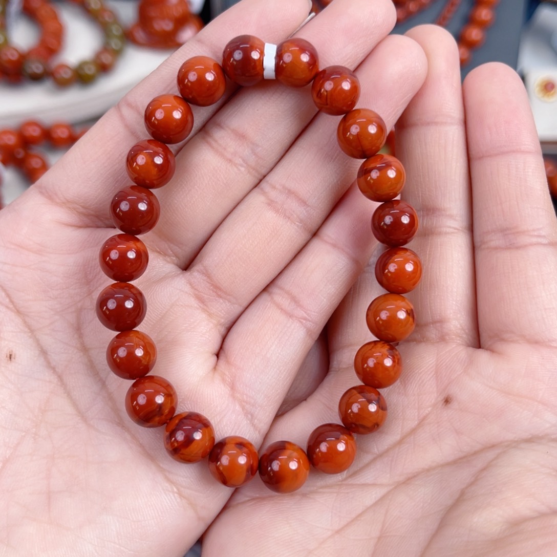 阳***厂南红玛瑙未镶嵌瓦西高货牛血双色火焰满肉单圈9mm