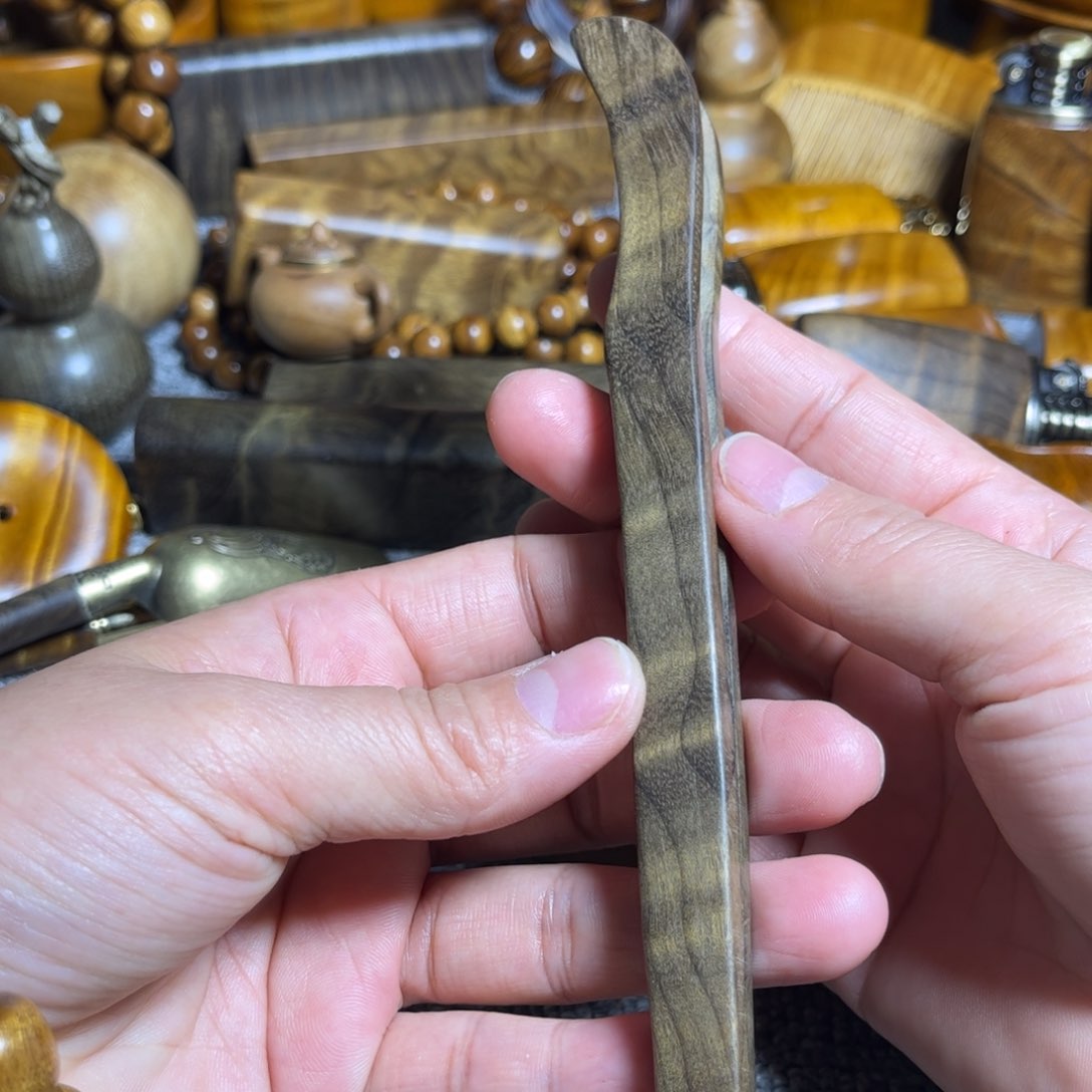 金丝楠阴沉木花纹茶夹