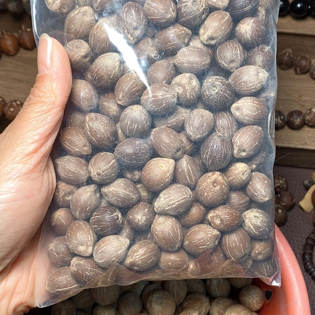 用***7香榧木紫金鼠散籽手串