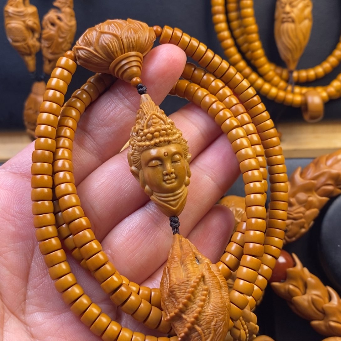 橄榄核手串观音脖挂