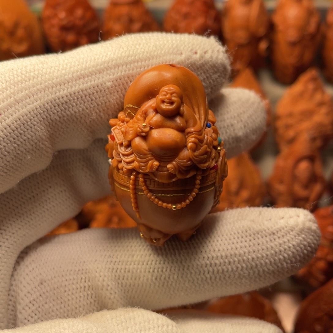 橄榄核吊坠聚宝弥勒