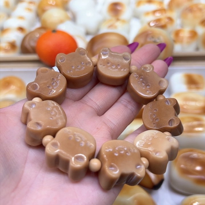 白玉菩提把件2.10.55象牙果风化小熊饼干微瑕