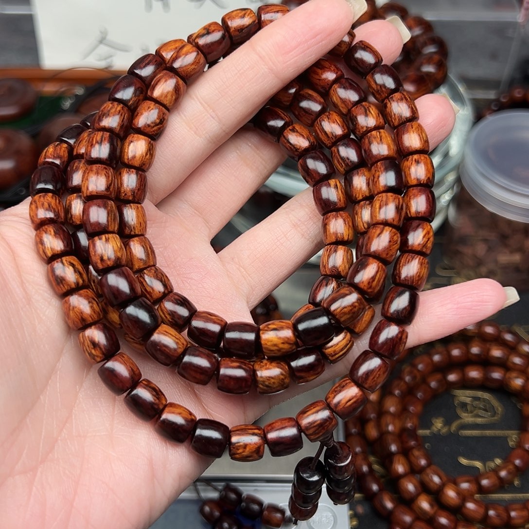 豆***豆木0.8海南红降108颗黑金满纹精品
