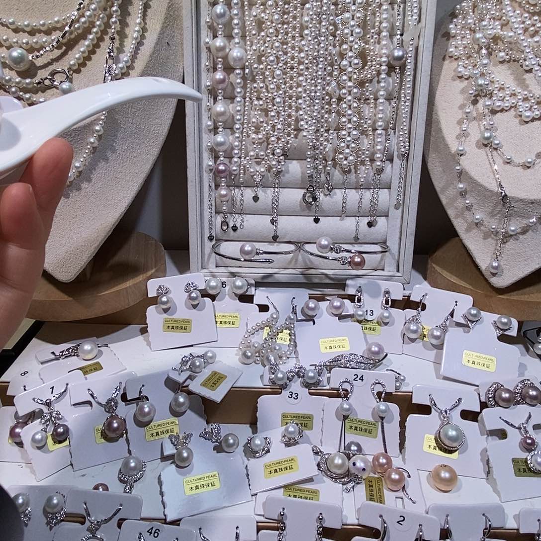 薇***澜银S925镶嵌淡水珍珠耳饰