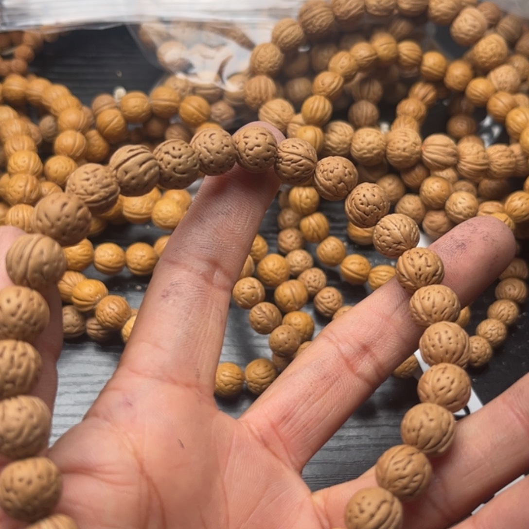 风***雨文玩核桃吊坠小桃核散籽批发