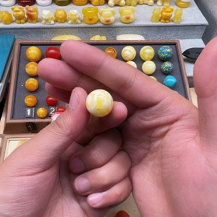 琥珀未镶嵌裸石黄白妖花单珠