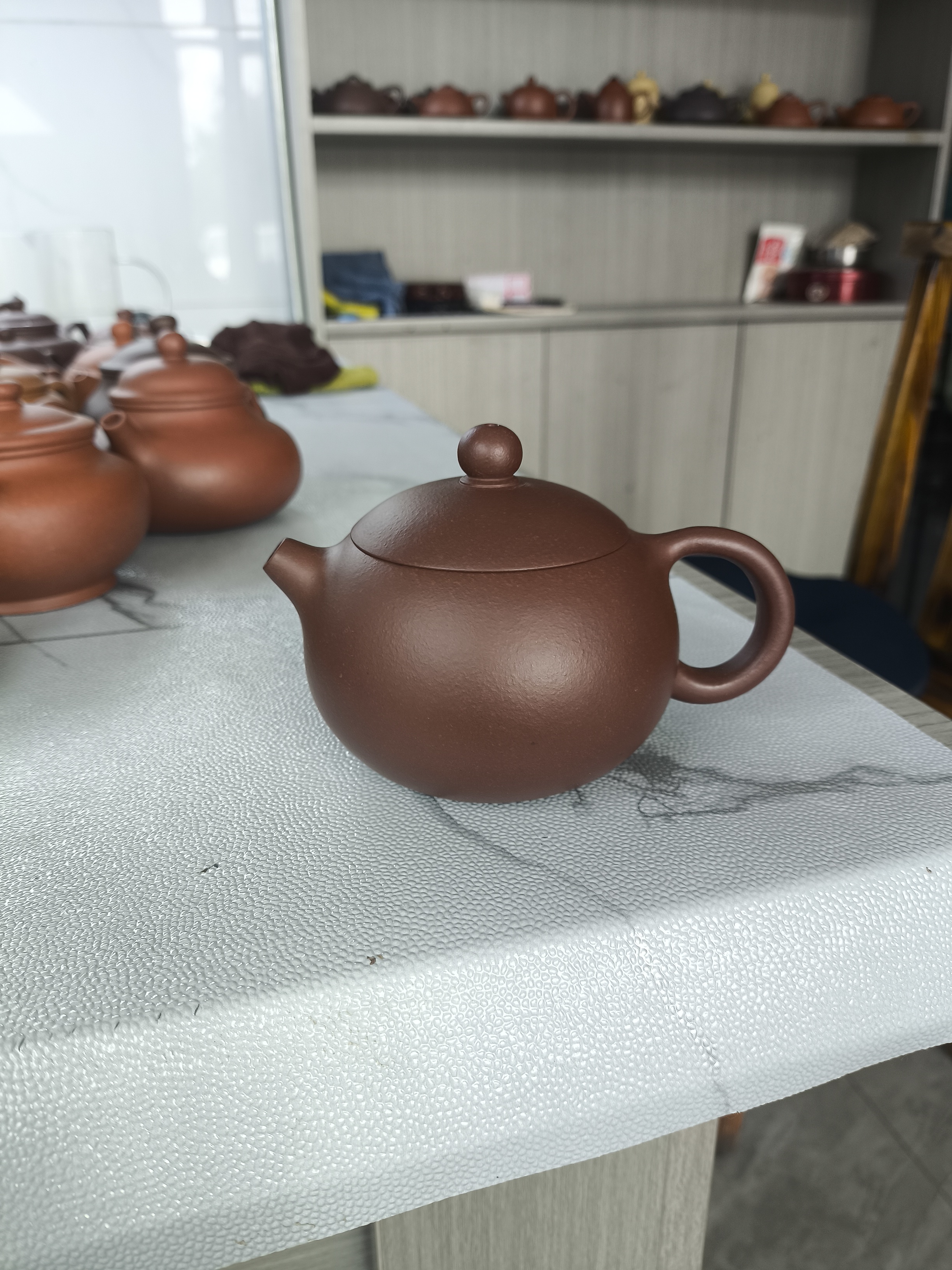 紫砂40目手磨料石红泥西施壶200CC