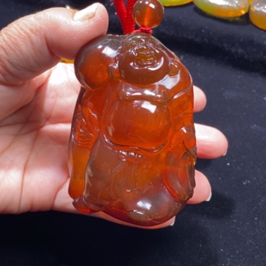 琥珀未镶嵌裸石血珀逍遥佛76.6克