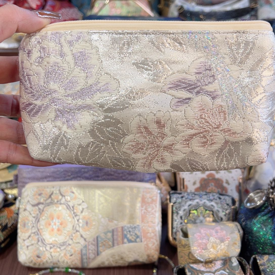 面***团蚕丝福利拉链现金包