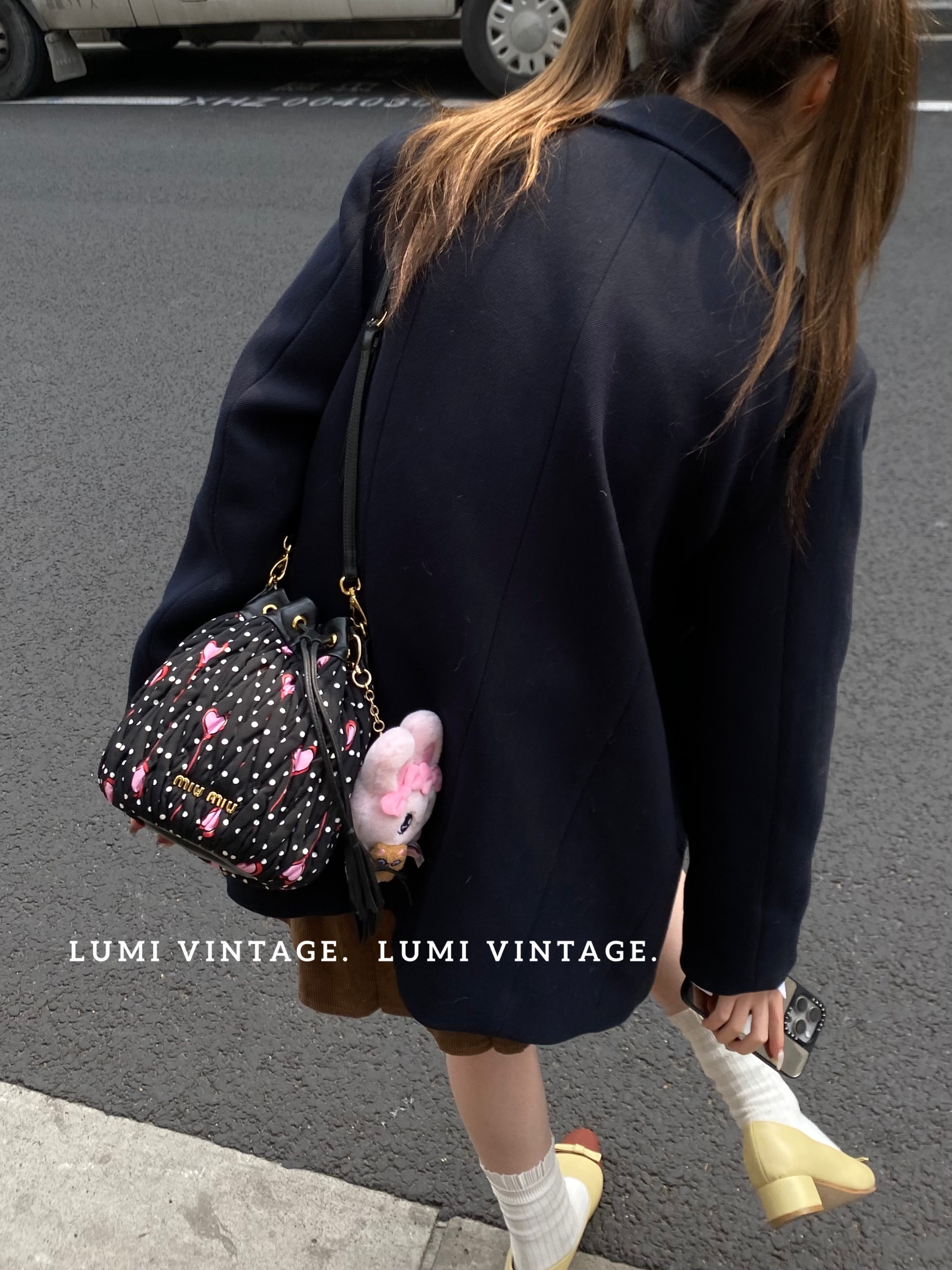 95新 MIU MIU/缪缪 黑色爱心波点水桶斜挎包 99995073