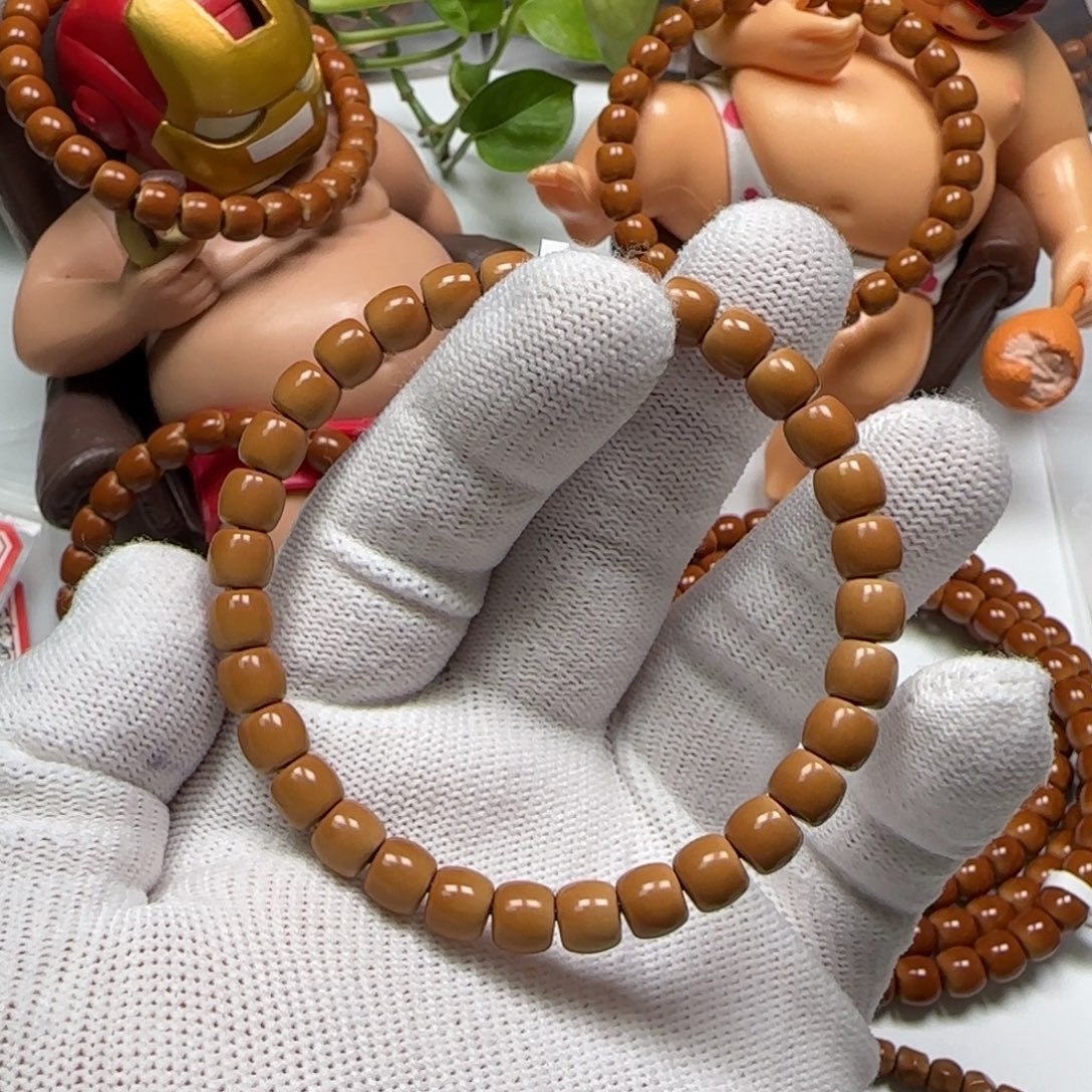 加***孩橄榄核手串/手链清水核尖单圈7.0