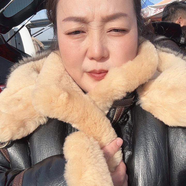 54码黑米色中长款皮毛一体