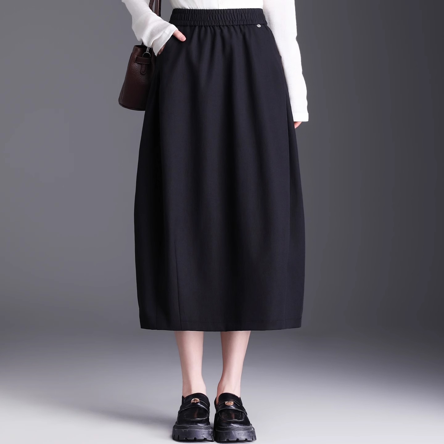 黑色简约花苞半身裙女秋季2025新款高腰显瘦a字裙中长款遮肉伞裙