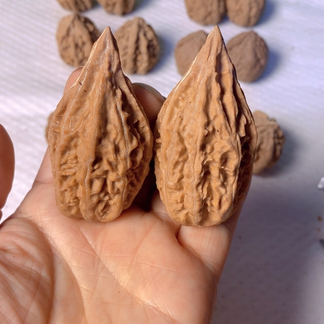 文玩核桃把件野生秋子手把文玩