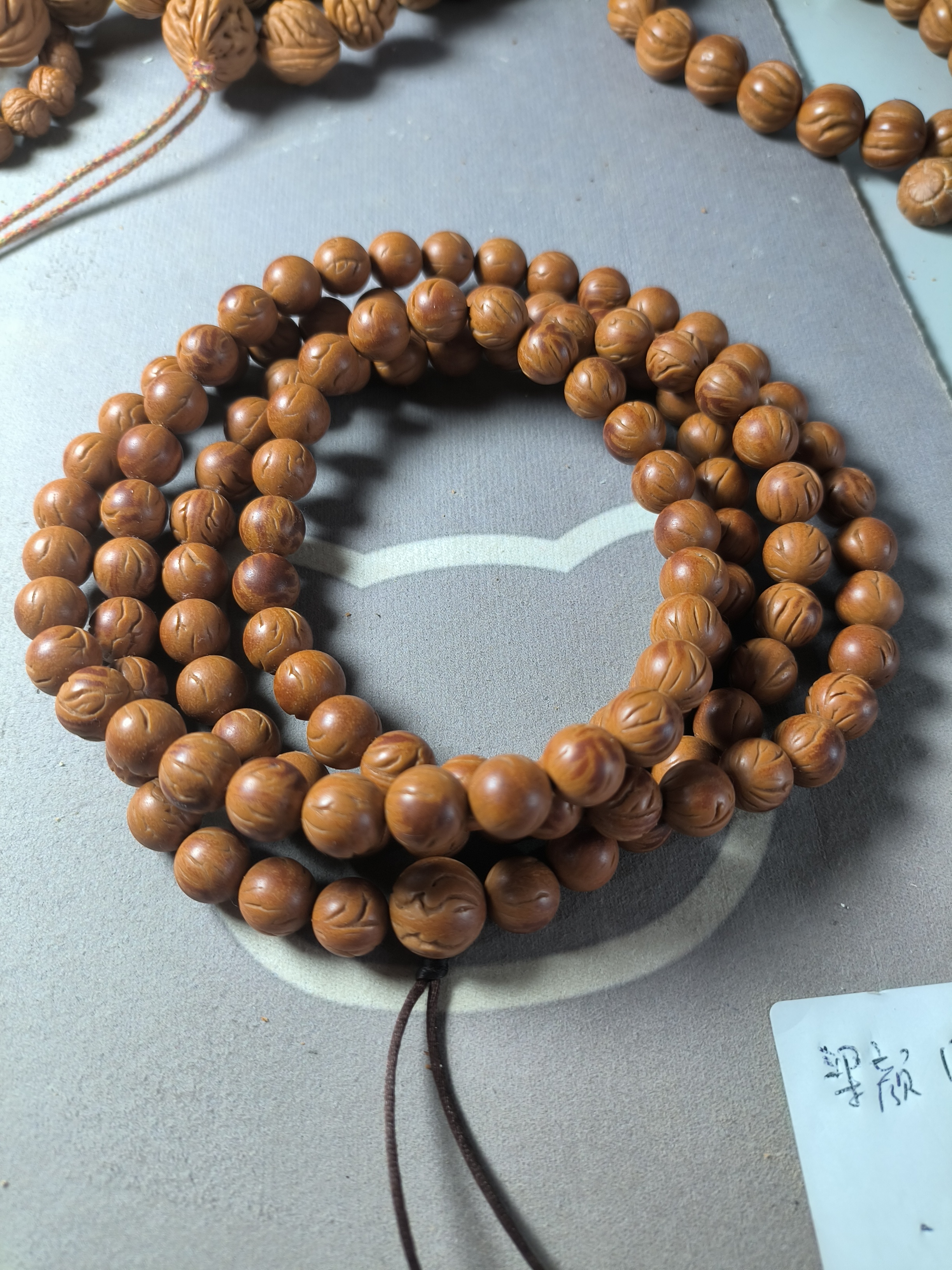 秦岭龙纹野生桃核光珠10加尺寸108颗佛珠