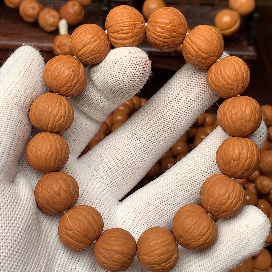 吊坠猴头核桃凤羽素串