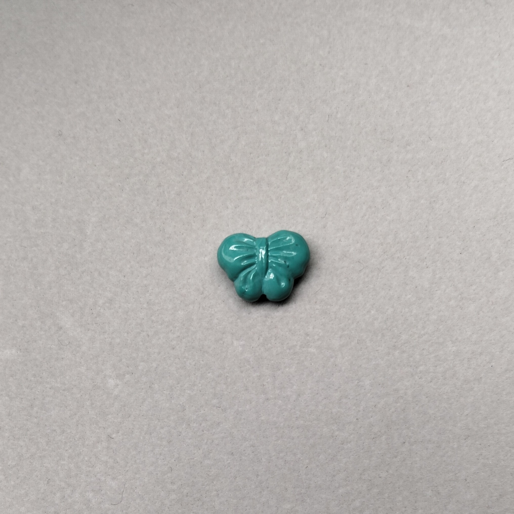 绿松石精雕蝴蝶结，11.8*8.8*4.5