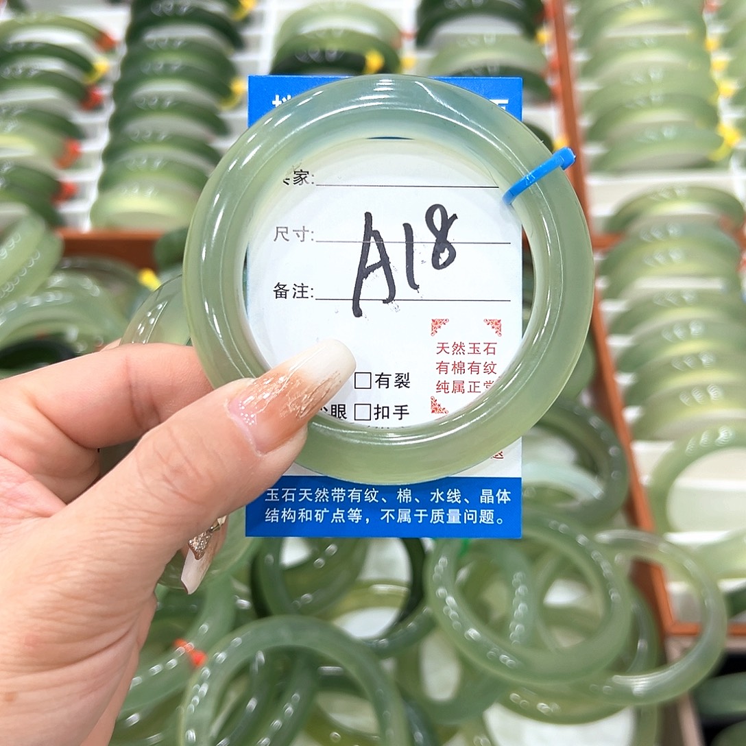 橘****蛇纹石玉未镶嵌手镯