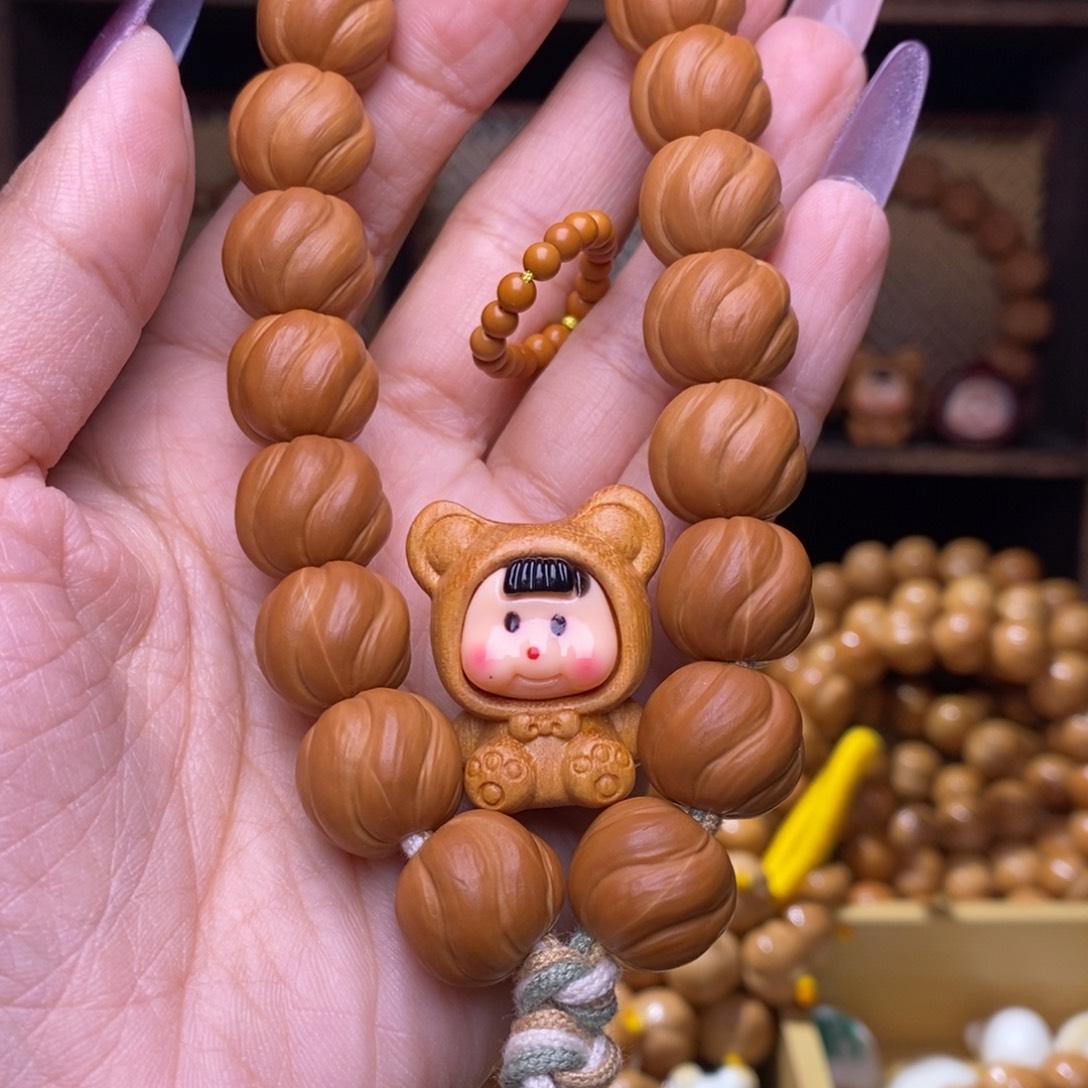 核桃猴头雕刻卷卷酥手持