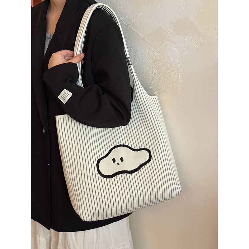 韩系复古条纹针织云朵包2025新款大容量单肩包小众外出通勤托特包