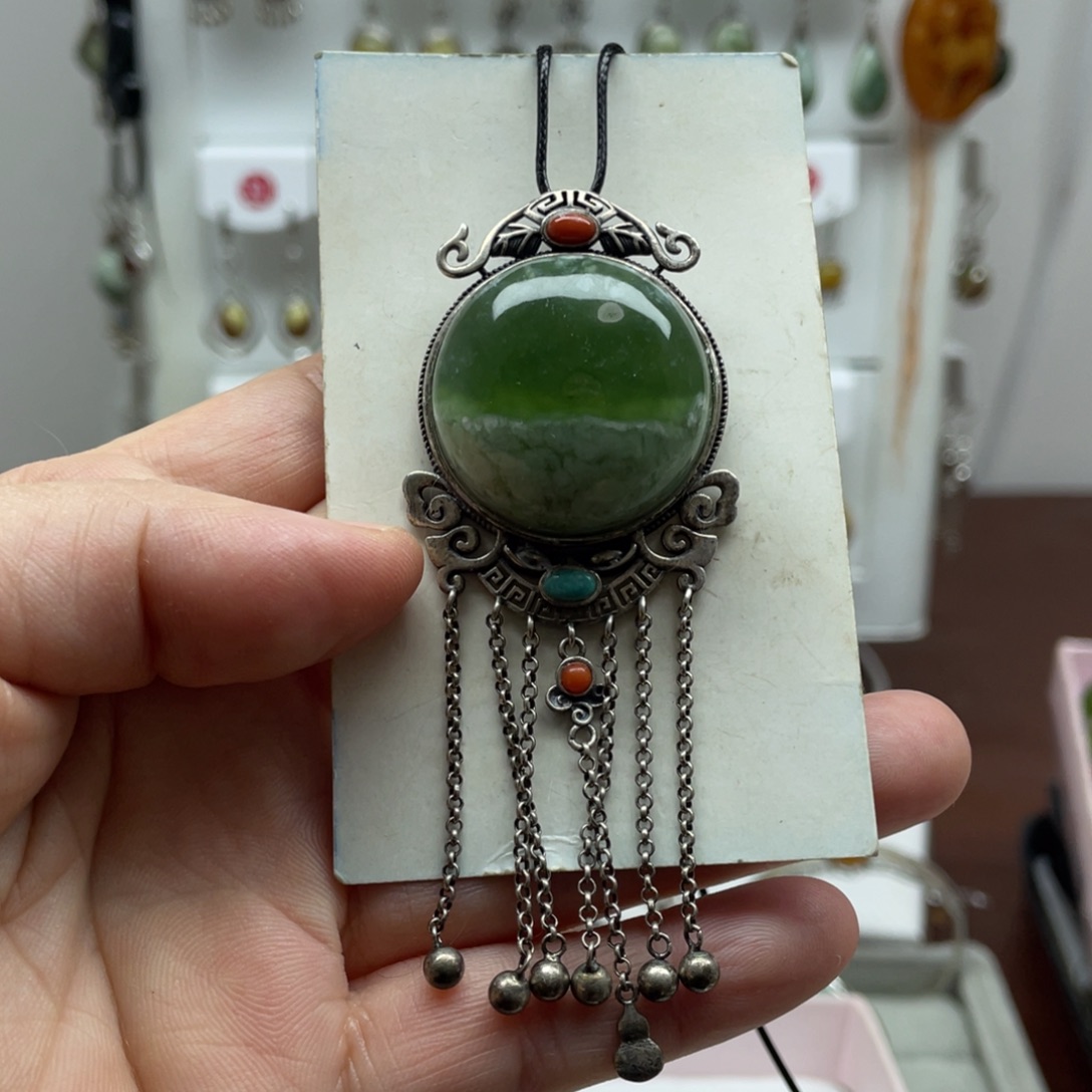 元***儿蛇纹石玉未镶嵌吊坠