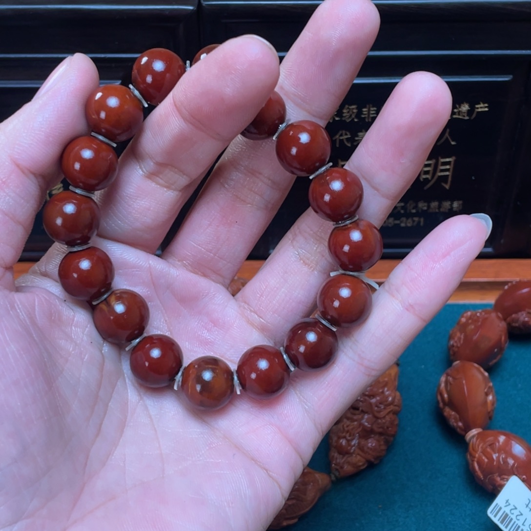 随***心橄榄核吊坠Dhd光珠